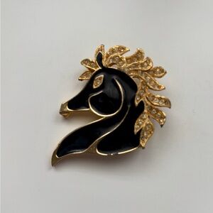 Elegant Black and Gold Horse Brooch